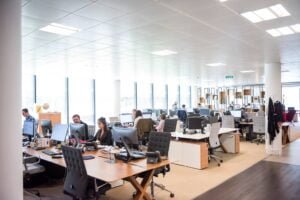 modern office space with people working on computers